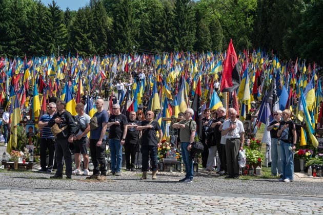 Commemoration procession held on Heroes Day in Lviv, Ukraine LVIV, UKRAINE, MAY 23: Military and civilians take part in a ceremony to honor the memory of fallen servicemen at the honorary burial grounds at the Lychakiv Cemetery during the Day of Heroes of Ukraine in Lviv, Ukraine, May 23, 2026. Also on this day, military personnel, police, members of youth organizations and civilians marched through the city in a solemn procession dedicated to all participants of the ATO JFO, war veterans and participants who died or are fighting for the freedom of Ukraine. Olena Znak Anadolu Lviv Ukraine. Editorial use only. Please get in touch for any other usage.  Copyright: x2026xAnadoluxOlenaxZnakx