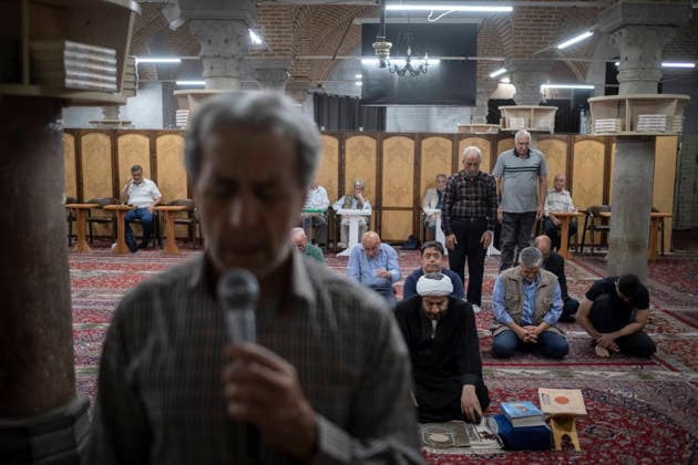 Daily Life In Iran Amid Threat About New Possible War Iranian worshippers prepare to take part in a mass prayer ceremony at a mosque in a business district in downtown Tehran, Iran, on May 22, 2026. U.S. President Donald Trump has indicated the possibility of military action against Iran if no agreement is reached with Iranian officials. Tehran Tehran Iran  Copyright: xMortezaxNikoubazlx originalFilename: nikoubazl-dailylif260522_npokZ.jpg