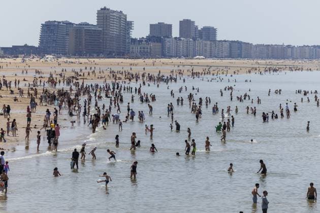 People enjoying the beach pictured at the Belgian coast in Oostende, on Saturday 23 May 2026. Tourists are expected to flock the Belgian coast, as temperatures are rising for the weekend.  NICOLASxMAETERLINCK 174833812