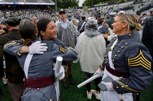 Graduating Cadets embrace at the conclusion of the West Point Class of 2026 s commencement ceremony in Michie Stadium at the United States Military Academy in West Point, New York on Saturday, May 23, 2026. .  NYP202605239021 PeterxFoley