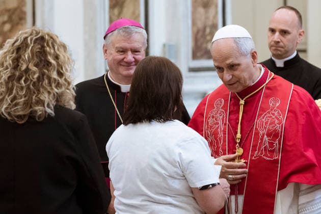 May 23, 2026, Acerra, Napoli, Italy: The Pope seen while talking with a family with victims of pollution. Pope Leo XIV visited Acerra for his patroral itinerary. He was the first Pope to visit the Land of Fires, a region affected by illegal dumping and burning of toxic waste in Campania region in Italy and meet families of victims of pollution in the Cathedral of Santa Maria Assunta in Acerra. Acerra Italy - ZUMAf172 20260523_zip_f172_043 Copyright: xValeriaxFerrarox