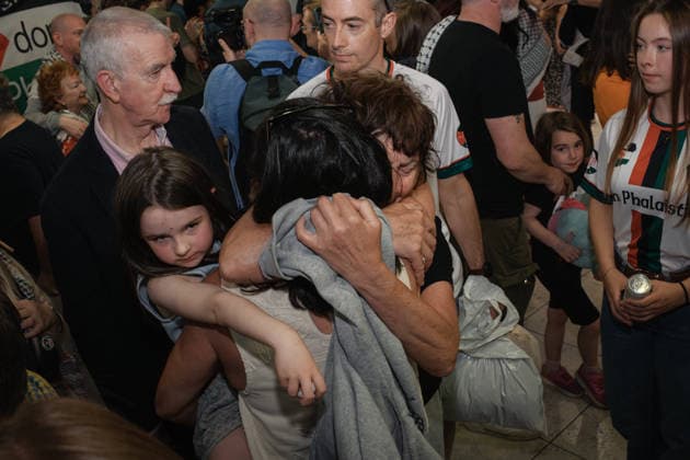May 23, 2026, Dublin, Ireland: Dr Margaret Connolly embraces her daughter, Katie, at Dublin Airport as fifteen Irish citizens who were detained by Israel arrive back in Ireland Irish flotilla activists return home to Dublin Airport after Israeli detention. Dublin Ireland - ZUMAs197 20260523_aaa_s197_188 Copyright: xGrahamxMartinx