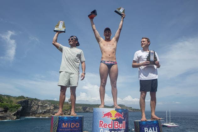 May 23, 2026, Klungkung, Bali, Indonesia: Aidan Heslop (Middle) 1 st, Jonathan Parades (Left) 2st and James Lichtenstein (Right) 3st of celebrates on the podium after winning the Red Bull Cliff Diving World Series at Broken Beach in Nusa Penida, Bali, Indonesia. Klungkung Indonesia - ZUMAp229 20260523_zip_p229_010 Copyright: xLanaxPriatnax