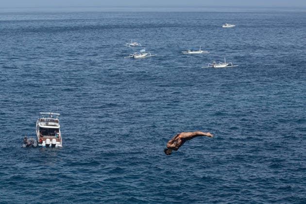 May 23, 2026, Klungkung, Bali, Indonesia: Catalin Preda of Romania dives from the 27-meter platform during the final round of the Red Bull Cliff Diving World Series at Broken Beach in Nusa Penida, Bali, Indonesia. Klungkung Indonesia - ZUMAp229 20260523_zip_p229_012 Copyright: xLanaxPriatnax