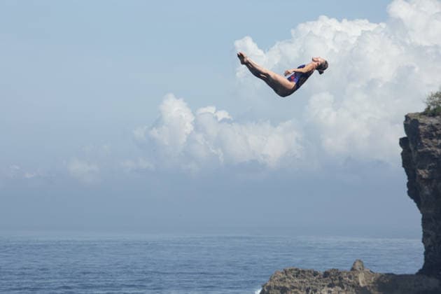 May 23, 2026, Klungkung, Bali, Indonesia: Kaylea Arnett of USA dives from the 21-meter platform during the final round of the Red Bull Cliff Diving World Series at Broken Beach in Nusa Penida, Bali, Indonesia. Klungkung Indonesia - ZUMAp229 20260523_zip_p229_018 Copyright: xLanaxPriatnax
