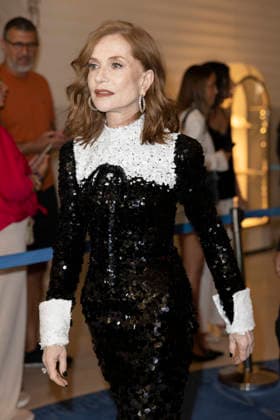 Cannes Isabelle Huppert exits Martinez MP CANNES, FRANCE - MAY 23: Isabelle Huppert leaves the Martinez Hotel to attend the closing awards ceremony during the 79th Cannes Film Festival on May 23, 2026 in Cannes, France. Photo by Marco Piovanotto Abacapress.com Cannes France  Copyright: xPiovanottoxMarco ABACAx