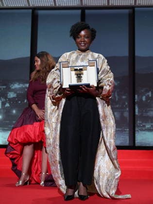 Cannes - Closing Ceremony Rwandan director and screenwriter Marie-Clementine Dusabejambo celebrates on stage after winning the Camera d Or Prize for the film Ben Imana during the closing ceremony of the 79th edition of the Cannes Film Festival in Cannes, France on May 23, 2026. Photo by Eliot Blondet ABACAPRESS.COM Cannes France  Copyright: xBlondetxEliot ABACAx