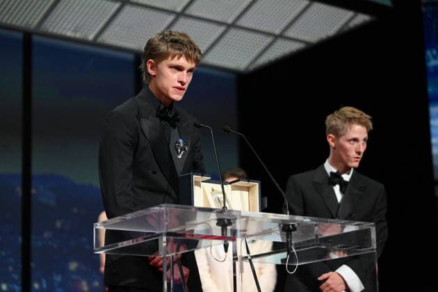 Cannes - Closing Ceremony Belgian actor Emmanuel Macchia and French actor Valentin Campagne celebrate on stage after winning ex-aequo the Best Actor Prize for the film Coward on stage during the closing ceremony of the 79th edition of the Cannes Film Festival in Cannes, France on May 23, 2026. Photo by Eliot Blondet ABACAPRESS.COM Cannes France  Copyright: xBlondetxEliot ABACAx