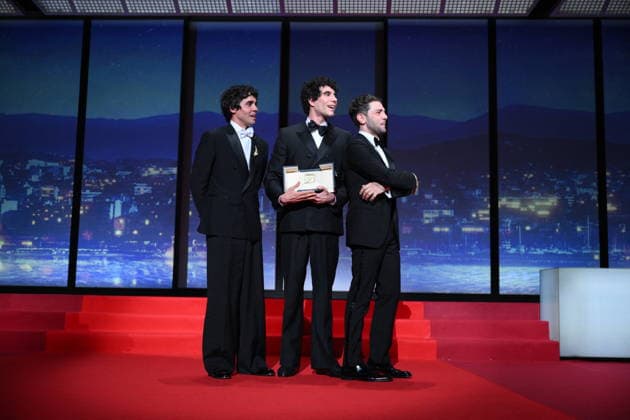 Cannes - Closing Ceremony Spanish director, screenwriter and producer Javier Ambrossi, Spanish director, screenwriter and producer Javier Calvo and Canadian filmmaker Xavier Dolan celebrate after winning the Best Director Prize for the film La Bola Negra during the closing ceremony of the 79th edition of the Cannes Film Festival in Cannes, France on May 23, 2026. Photo by Eliot Blondet ABACAPRESS.COM Cannes France  Copyright: xBlondetxEliot ABACAx