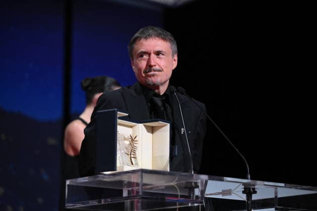 Cannes - Fjord Wins Palme D Or Award At Closing Ceremony Romanian director, screenwriter and producer Cristian Mungiu celebrates on stage after winning the Palme d Or for the film Fjord during the closing ceremony of the 79th edition of the Cannes Film Festival in Cannes, France on May 23, 2026. Photo by Eliot Blondet ABACAPRESS.COM Cannes France  Copyright: xBlondetxEliot ABACAx
