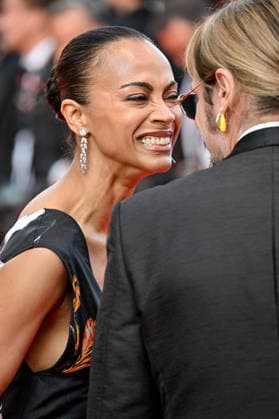 Cannes Closing Ceremony JR Zoe Saldana attending the Closing Ceremony during the 79th Cannes Film Festival in Cannes, France on May 23, 2026. Photo by Julien Reynaud APS-Medias ABACAPRESS.COM Cannes France  Copyright: xReynaudxJulien APS-Medias ABACAx