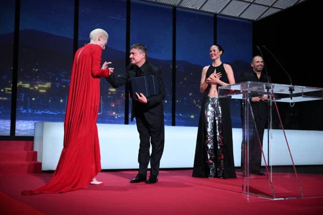 Cannes - Fjord Wins Palme D Or Award At Closing Ceremony (L-R) British actress, Tilda Swinton, Romanian director, screenwriter and producer Cristian Mungiu, Norwegian actress, Renate Reinsve and Romanian-born American actor Sebastian Stan celebrate on stage after winning the Palme d Or for the film Fjord during the closing ceremony of the 79th edition of the Cannes Film Festival in Cannes, France on May 23, 2026. Photo by Eliot Blondet ABACAPRESS.COM Cannes France  Copyright: xBlondetxEliot ABACAx