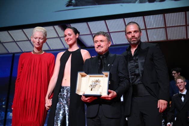 Cannes - Fjord Wins Palme D Or Award At Closing Ceremony (L-R) British actress, Tilda Swinton, Norwegian actress, Renate Reinsve, Romanian director, screenwriter and producer Cristian Mungiu and Romanian-born American actor Sebastian Stan celebrate on stage after winning the Palme d Or for the film Fjord during the closing ceremony of the 79th edition of the Cannes Film Festival in Cannes, France on May 23, 2026. Photo by Eliot Blondet ABACAPRESS.COM Cannes France  Copyright: xBlondetxEliot ABACAx