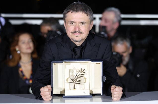 Cannes - Fjord Wins Palme D Or Award At Closing Ceremony Romanian director, screenwriter and producer Cristian Mungiu celebrate after winning the Palme d Or for the film Fjord during the photocall of the 79th edition of the Cannes Film Festival in Cannes, France on May 23, 2026. Photo by Jerome Domine ABACAPRESS.COM Cannes France  Copyright: xDominexJerome ABACAx
