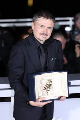Cannes - Fjord Wins Palme D Or Award At Closing Ceremony Romanian director, screenwriter and producer Cristian Mungiu celebrate after winning the Palme d Or for the film Fjord during the photocall of the 79th edition of the Cannes Film Festival in Cannes, France on May 23, 2026. Photo by Jerome Domine ABACAPRESS.COM Cannes France  Copyright: xDominexJerome ABACAx