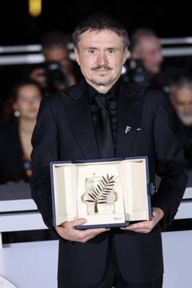 Cannes - Fjord Wins Palme D Or Award At Closing Ceremony Romanian director, screenwriter and producer Cristian Mungiu celebrate after winning the Palme d Or for the film Fjord during the photocall of the 79th edition of the Cannes Film Festival in Cannes, France on May 23, 2026. Photo by Jerome Domine ABACAPRESS.COM Cannes France  Copyright: xDominexJerome ABACAx