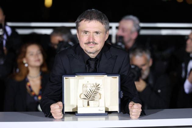 Cannes - Fjord Wins Palme D Or Award At Closing Ceremony Romanian director, screenwriter and producer Cristian Mungiu celebrate after winning the Palme d Or for the film Fjord during the photocall of the 79th edition of the Cannes Film Festival in Cannes, France on May 23, 2026. Photo by Jerome Domine ABACAPRESS.COM Cannes France  Copyright: xDominexJerome ABACAx