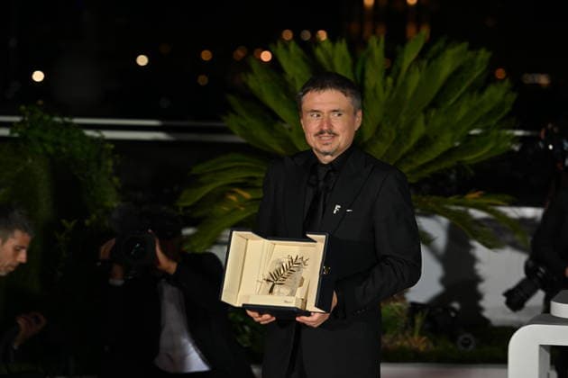 79th Cannes Film Festival - Closing Ceremony CANNES, FRANCE - MAY 23: Romanian director, screenwriter and producer Cristian Mungiu poses with the trophy during a photocall after winning the Palme d Or for the film Fjord during the closing ceremony of the 79th edition of the Cannes Film Festival in Cannes, southern France, on May 23, 2026. Mustafa Yalcin Anadolu Cannes France. Editorial use only. Please get in touch for any other usage.  Copyright: x2026xAnadoluxMustafaxYalcinx
