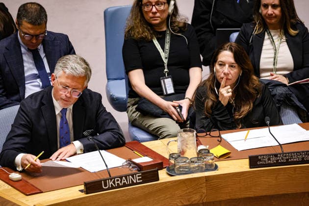 May 23, 2026, New York, New York, USA: (L to R) ANDRII MELNYK, Permanent Representative of Ukraine to the UN looks over notes as VANESSA FRAZIER, Special Representative of the Secretary-General for Children and Armed Conflict, sits next to him during an emergency UN Security Council meeting on Ukraine at UNHQ following Russian allegations of a Ukrainian drone strike on a vocational school and student dormitory in Russian-controlled Luhansk, which Ukraine denies targeted civilians. New York USA - ZUMAo116 20260523_znp_o116_014 Copyright: xBiancaxOterox