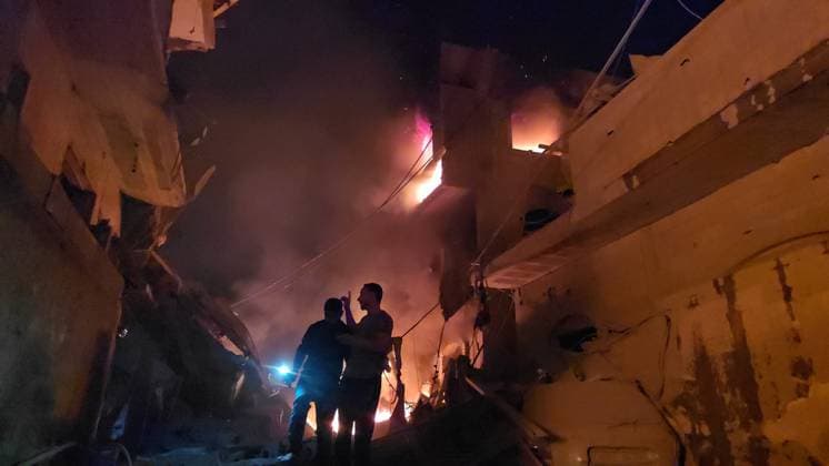 Israeli army continues attacking Gaza despite ceasefire DEIR AL-BALAH, GAZA, PALESTINE - MAY 23: Thick smoke and flames rise from a multi-story apartment building following an Israeli air strike in the city of Deir al-Balah, located in the central Gaza Strip, Palestine on May 23, 2026. Stringer Anadolu Deir al-Balah Gaza. Editorial use only. Please get in touch for any other usage.  Copyright: x2026xAnadoluxStringerx