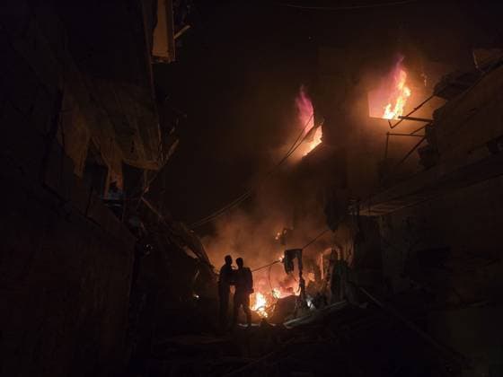 Israeli army continues attacking Gaza despite ceasefire DEIR AL-BALAH, GAZA, PALESTINE - MAY 23: Thick smoke and flames rise from a multi-story apartment building following an Israeli air strike in the city of Deir al-Balah, located in the central Gaza Strip, Palestine on May 23, 2026. Stringer Anadolu Deir al-Balah Gaza. Editorial use only. Please get in touch for any other usage.  Copyright: x2026xAnadoluxStringerx