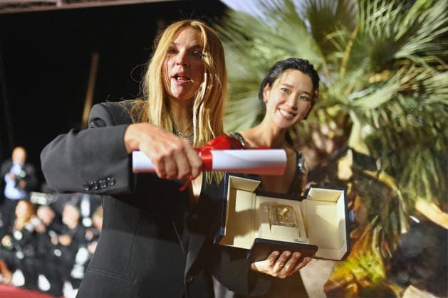 Cannes Winners Photocall FC Tao Okamoto and Virginie Efira pose with the Best Actress award for All Of A Sudden during the Palme DOr winners photocall at the 79th annual Cannes Film Festival at Palais des Festivals on May 23, 2026 in Cannes, France .Photo by Franck Castel ABACAPRESS.COM Cannes  Copyright: xCastelxFranck ABACAx