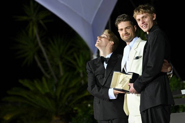 Cannes Winners Photocall FC Valentin Campagne, Lukas Dhont and Emmanuel Macchia pose with the Best Actor award for Coward during the Palme DOr winners photocall at the 79th annual Cannes Film Festival at Palais des Festivals on May 23, 2026 in Cannes, France.Photo by Franck Castel ABACAPRESS.COM Cannes  Copyright: xCastelxFranck ABACAx
