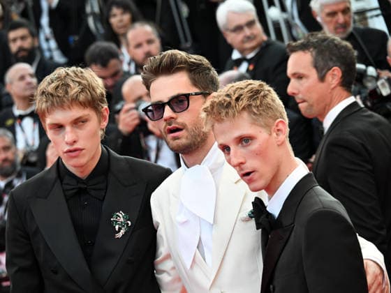IPA85016836 - Cannes, 79th Cannes Film Festival 2026 - Final Evening - Red Carpet Closing Ceremony. Pictured are Valentin Campagne, Lukas Dhont, Emmanuel Macchia  Copyright: xManuelexMangiarottix xPoolxPhotoxEventsx07x 85016836