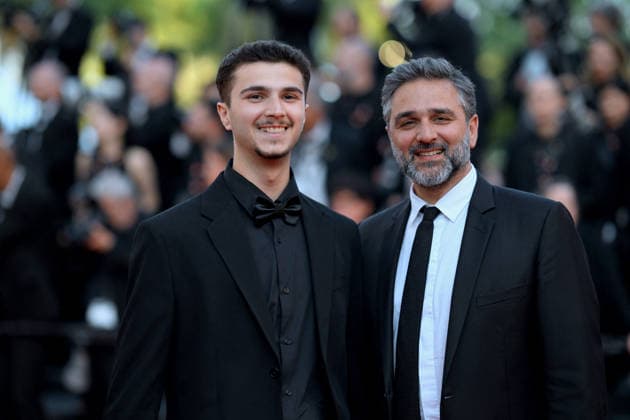 Cannes Closing Ceremony Red Carpet FC Olivier Nakache (L) and guest attends the closing ceremony of the 79th annual Cannes Film Festival at Palais des Festivals on May 23, 2026 in Cannes, France. Photo by Franck Castel ABACAPRESS.COM Cannes  Copyright: xCastelxFranck ABACAx