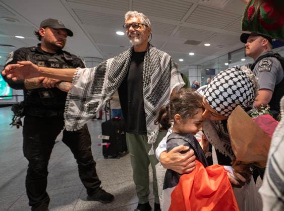 May 23, 2026, Montreal, Pq, CANADA: Ehab Lotayef, left, and Safa Chebbi, right, are greeted as they arrive back at Montreal s Trudeau International Airport on Saturday, May 23, 2026. Chebbi and Lotayef were two of the 12 Canadians who were on board a flotilla trying to reach Gaza and spent four days in Israeli captivity. Montreal CANADA  - ZUMAc35_ 20260523_zaf_c35_153 Copyright: xPeterxMccabex