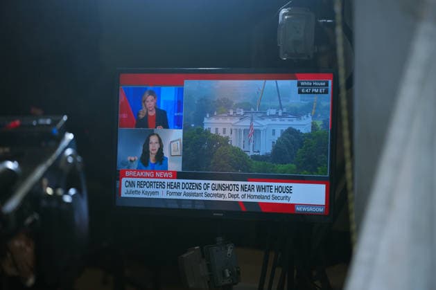A CNN News report is broadcast on the North Lawn following reports of alleged gun fire near the White House in Washington, DC, US, on Saturday, May 23, 2026. A man was shot by US Secret Service agents near the White House on Saturday after he opened fire with a handgun, according to a person familiar with the matter. Copyright: xAaronxSchwartzx xPoolxviaxCNPx MediaPunchx
