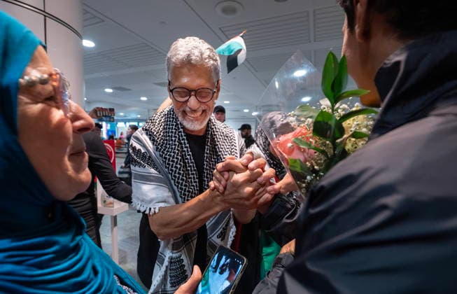 May 23, 2026, Montreal, Pq, CANADA: Ehab Lotayef is greeted at Montreal s Trudeau International Airport on Saturday, May 23, 2026. Lotayef was one of the 12 Canadians who were on board a flotilla trying to reach Gaza and spent four days in Israeli captivity. Montreal CANADA  - ZUMAc35_ 20260523_zaf_c35_167 Copyright: xPeterxMccabex