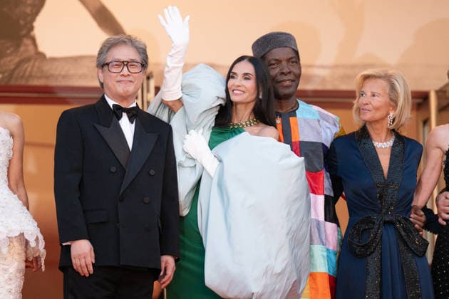Cannes Closing Ceremony Red Carpet LZ Park Chan-wook, Demi Moore and Isaach De Bankole attending the Closing Ceremony Red Carpet during the 79th Cannes International Film Festival in Cannes, France on May 23, 2026, the film selected in the Official Competition. Photo by Laurent Zabulon ABACAPRESS.COM  Copyright: xZabulonxLaurentx
