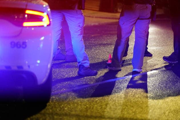 May 23, 2026, Washington, District Of Columbia, USA: Police investigators collect evidence in the 1700 block of Pennsylvania Avenue, Northwest, which is one block west of the White House in Washington, DC, USA, following the shooting there on Saturday, May 23, 2026. Two people were shot and taken to a local hospital, one has died Washington USA - ZUMAs152 20260523_faa_s152_034 Copyright: xAndrewxThomasx