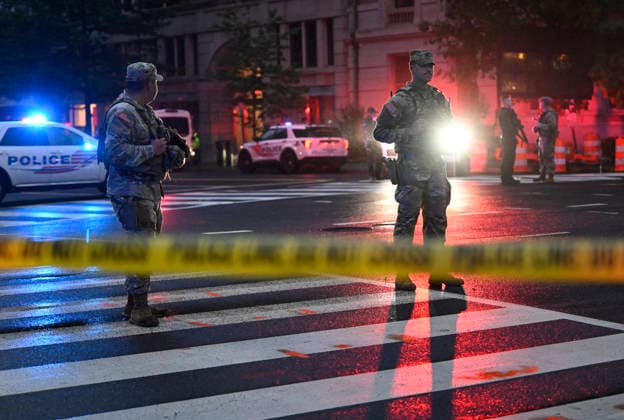 Multiple Shots Fired Half A Block From White House Complex Law enforcement, including members of the National Guard work the scene after multiple rapid-fire gunshots ring out outside the White House on May 23, 2026 in Washington, DC. A suspect was killed after opening fire on a Secret Service checkpoint outside the White House Saturday evening. Photo by Olivier Douliery ABACAPRESS.COM Washington DC United States  Copyright: xDoulieryxOlivier ABACAx