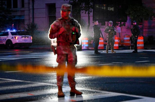 Multiple Shots Fired Half A Block From White House Complex Law enforcement, including members of the National Guard work the scene after multiple rapid-fire gunshots ring out outside the White House on May 23, 2026 in Washington, DC. A suspect was killed after opening fire on a Secret Service checkpoint outside the White House Saturday evening. Photo by Olivier Douliery ABACAPRESS.COM Washington DC United States  Copyright: xDoulieryxOlivier ABACAx