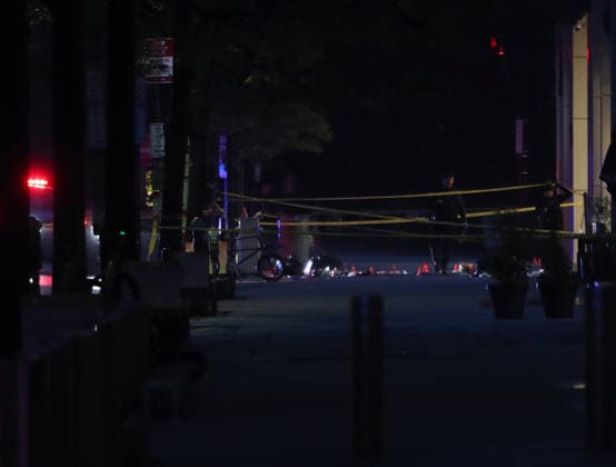 May 23, 2026, Washington, District Of Columbia, USA: Forensic investigators take photos behind a police tape blocking off a crime scene with evidence markers seen on a sidewalk on 17th and Pennsylvania Ave near the White House in Washington, DC, USA on May 23, 2026. Police and security forces swarmed the area around the White House on the evening of May 23 after reports of shots fired. Washington USA - ZUMAs337 20260523_znp_s337_004 Copyright: xGentxShkullakux