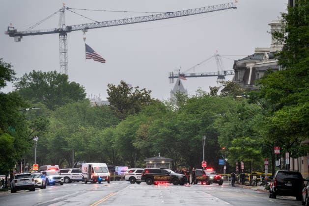 May 23, 2026, Washington, Dc, USA: Emergency vehicles crowd the intersection where a gunman fired a volley of shots near the White House before being shot and fatally wounded by U.S. Secret Service police officers. Another person was also injured, according to law enforcement officials. Tower cranes in the background are in use building a new White House ballroom under the direction of President Trump. Washington, DC, May 23, 2026. Photo: Zuma Press Washington USA - ZUMAmj3_ 20260523_zaf_mj3_003 Copyright: xJayxMallinx