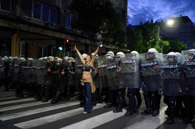 May 23, 2026, Belgrade, Central Serbia, Serbia: 2026523, Belgrade, Serbia - A large number of citizens answer the call of university students and gather to protest in the center of Belgrade. A female demonstrator gestures defiantly while standing in front of a riot police cordon. Belgrade Serbia - ZUMAd223 20260523_zip_d223_013 Copyright: xMarkoxDimicx