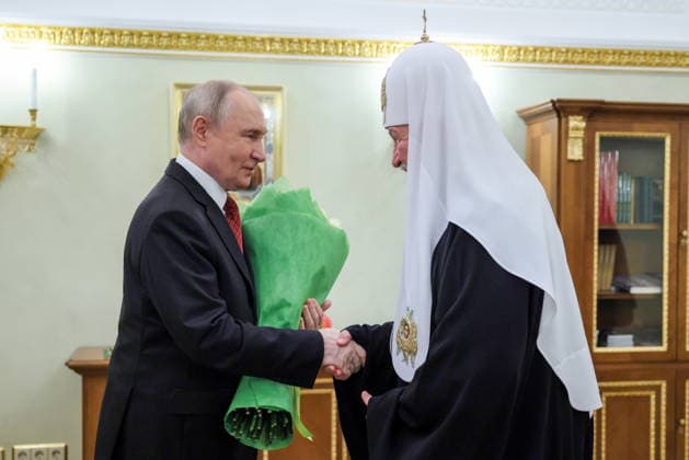 RUSSIA, MOSCOW - MAY 24, 2026: Vladimir Putin (L), President of Russia, congratulates Patriarch Kirill of Moscow and All Russia on his Name Day during a meeting at the Moscow Kremlin. Vyacheslav Prokofyev Russian Presidential Press and Information Office TASS  92974763