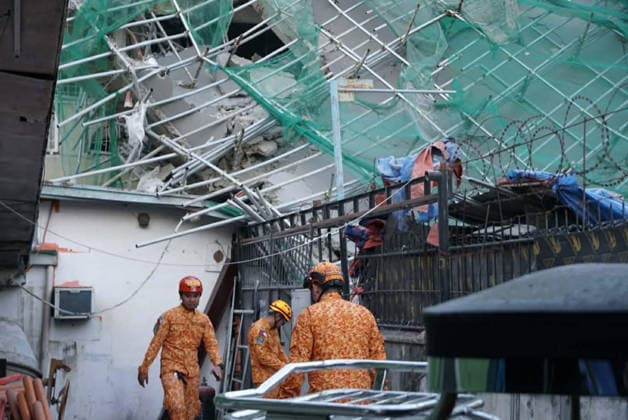 Building collapsed in Philippines, trapping multiple people, killing at least one ANGELES, PAMPANGA PROVINCE, PHILIPPINES - MAY 24: (----EDITORIAL USE ONLY - MANDATORY CREDIT - BUREAU OF FIRE PROTECTION (BFP) HANDOUT - NO MARKETING NO ADVERTISING CAMPAIGNS - DISTRIBUTED AS A SERVICE TO CLIENTS----) Rescuers conduct search and rescue operations at the rubble of a building after it collapsed, in Angeles, Pampanga Province, Philippines, on May 24, 2026. One Malaysian national has been found dead, at least 24 were rescued alive and at least 21 are still missing, after the nine-storey building that was under construction collapsed, according to the local authorities. Bureau of Fire Protection Handout Anadolu Angeles Philippines. Editoria  Copyright: x2026xAnadoluxBureauxofxFirexProtectionx xHandoutx
