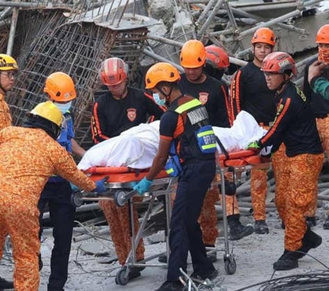 Building collapsed in Philippines, trapping multiple people, killing at least one ANGELES, PAMPANGA PROVINCE, PHILIPPINES - MAY 24: (----EDITORIAL USE ONLY - MANDATORY CREDIT - BUREAU OF FIRE PROTECTION (BFP) HANDOUT - NO MARKETING NO ADVERTISING CAMPAIGNS - DISTRIBUTED AS A SERVICE TO CLIENTS----) (EDITORS NOTE: Image depicts death) A body of a Malaysian national was recovered from the rubble of a building after it collapsed, in Angeles, Pampanga Province, Philippines, on May 24, 2026. One Malaysian national has been found dead, at least 24 were rescued alive and at least 21 are still missing, after the nine-storey building that was under construction collapsed, according to the local authorities. Search and rescue efforts are still un  Copyright: x2026xAnadoluxBureauxofxFirexProtectionx xHandoutx
