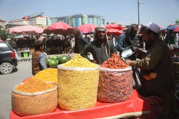 (260524) -- KABUL, May 24, 2026 -- People buy snacks for Eid al-Adha in Kabul, Afghanistan, on May 24, 2026. While Muslims worldwide prepare to mark Eid al-Adha by sacrificing animals and sharing meat with families in need, Afghans are once again observing the sacred festival under the heavy shadow of profound economic hardship. TO GO WITH Feature: Afghans mark Eid al-Adha as tradition collides with crushing poverty (Photo by Xinhua) AFGHANISTAN-KABUL-EID AL-ADHA SaifurahmanxSafi 