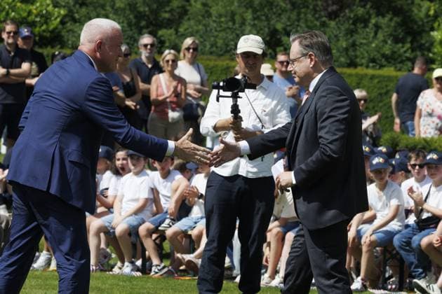 US ambassador to Belgium Bill White and Prime Minister Bart De Wever pictured during the annual Memorial Day ceremony at the Flanders Field American Cemetery, in Waregem, Sunday 24 May 2026.  NICOLASxMAETERLINCK 174928900