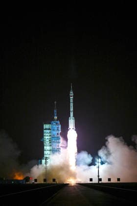 (260524) -- JIUQUAN, May 24, 2026 -- The Shenzhou-23 crewed spaceship, atop a Long March-2F carrier rocket, blasts off from the Jiuquan Satellite Launch Center in northwest China, May 24, 2026. China launched the Shenzhou-23 crewed spaceship on Sunday, which will send three astronauts to its orbiting Tiangong space station. ) FOCUS China launches Shenzhou-23 crewed spaceship LixZhipeng 