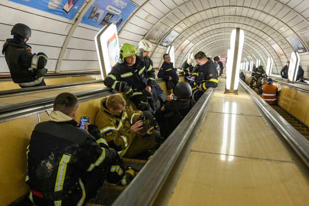 One Of The Largest Combined Missile And Drone Attacks On The Ukrainian Capital Overnight Rescuers take shelter inside a Kyiv metro station after suspending rescue operations due to an air raid alert and the threat of another Russian military operation during one of the largest combined missile and drone operations on the Ukrainian capital overnight on May 24, 2026. Kyiv is the main target of the operation. A total of 604 aerial targets are intercepted, including 55 missiles and 549 drones. At least two people are killed and 77 injured, including children. Kyiv Ukraine  Copyright: xMaxymxMarusenkox originalFilename: musiienko-notitle260524_npu47.jpg