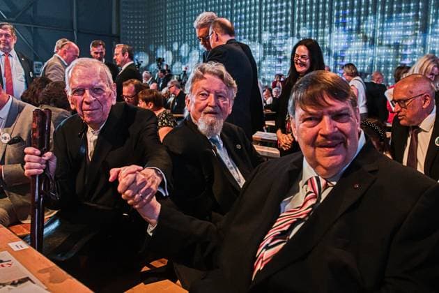 The Sudeten German leader Bernd Posselt, right, and writer and former dissident Milan Uhde, left, are holding hands at the 76th Sudeten German Congress in Brno continued at Brno Exhibition Centre on Sunday, May 24, 2026. Uhde was presented with the Sudeten Germans Award. (CTKxPhoto PatrikxUhlir) CTKPhotoP2026052405212  CTKPhotoP2026052405212