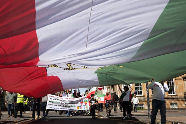May 24, 2026, Glasgow, Scotland, UK: Members of Scotlands Iranian community opposed to the Islamic regime were joined by compatriots from further afield at a demonstration supporting anti-regime protesters imprisoned in Iran following uprisings earlier this year. Protesters voiced concerns over alleged human rights abuses and executions carried out by the regime. Glasgow UK  - ZUMAs357 20260524_zip_s357_009 Copyright: xCameronxScottx