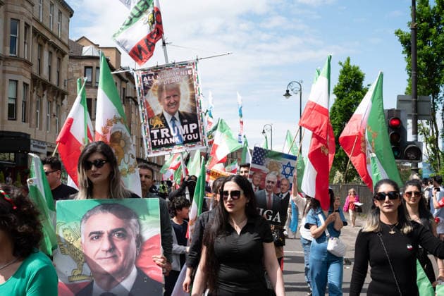 May 24, 2026, Glasgow, Scotland, UK: Members of Scotlands Iranian community opposed to the Islamic regime were joined by compatriots from further afield at a demonstration supporting anti-regime protesters imprisoned in Iran following uprisings earlier this year. Protesters voiced concerns over alleged human rights abuses and executions carried out by the regime. Glasgow UK  - ZUMAs357 20260524_zip_s357_011 Copyright: xCameronxScottx