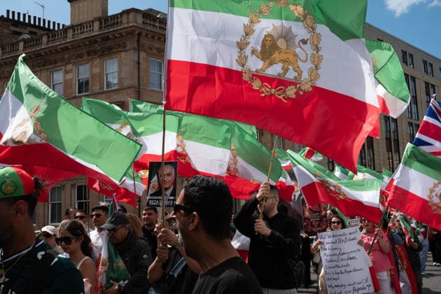 May 24, 2026, Glasgow, Scotland, UK: Members of Scotlands Iranian community opposed to the Islamic regime were joined by compatriots from further afield at a demonstration supporting anti-regime protesters imprisoned in Iran following uprisings earlier this year. Protesters voiced concerns over alleged human rights abuses and executions carried out by the regime. Glasgow UK  - ZUMAs357 20260524_zip_s357_012 Copyright: xCameronxScottx